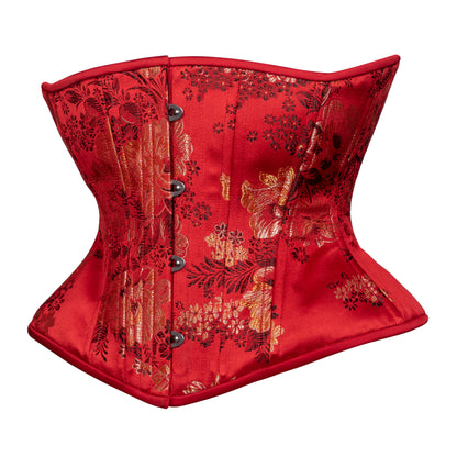 Red corset with floral patterns on a white background
