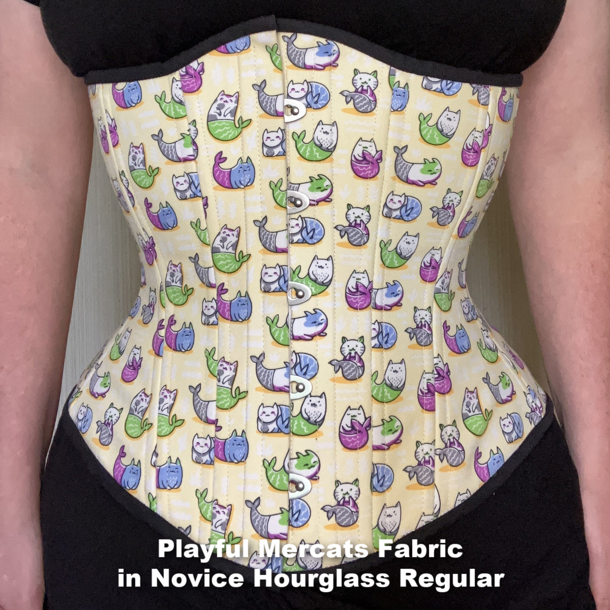 Playful Mercats Fabric in Novice Hourglass Regular. Front View