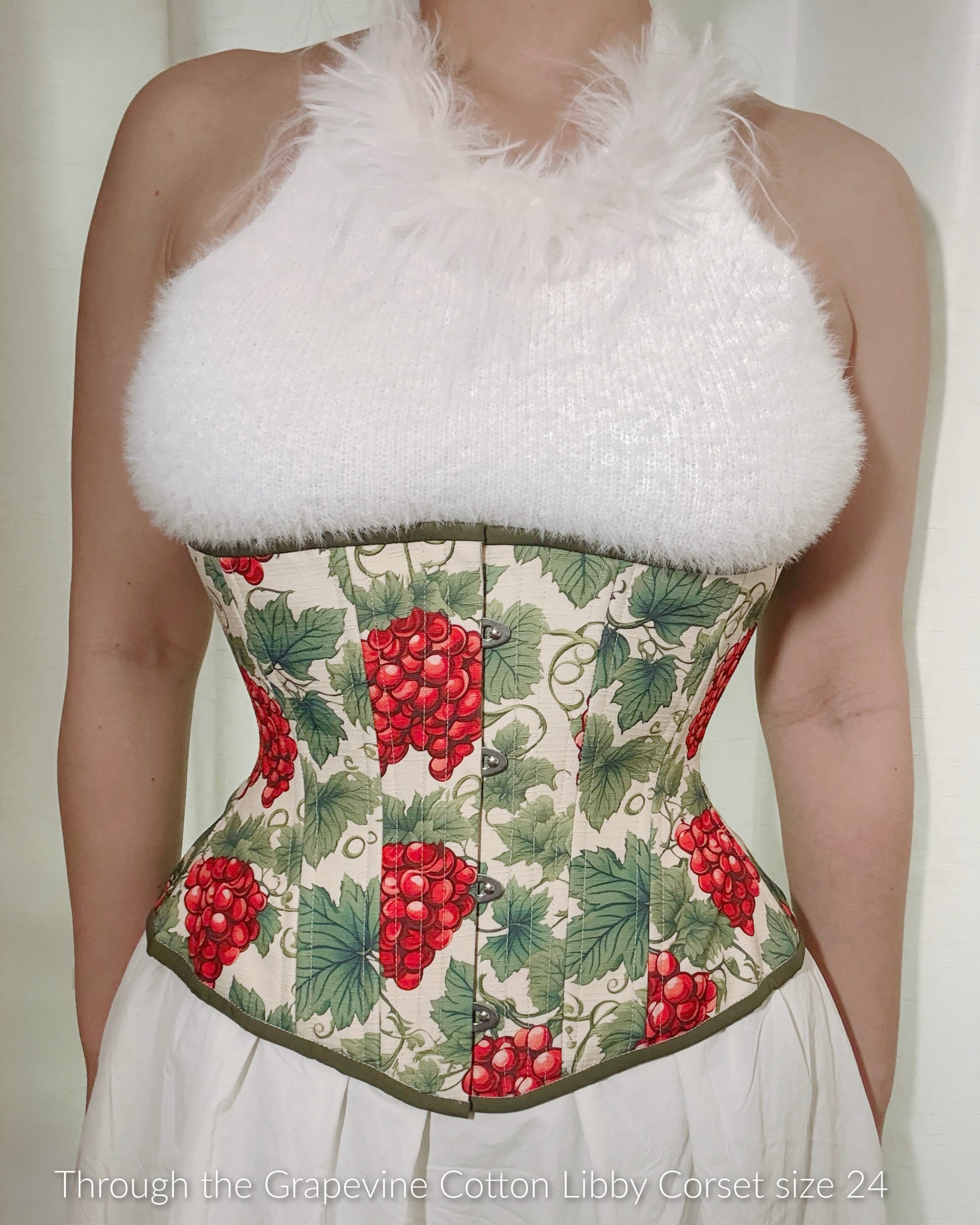 Through the Grapevine cotton corset, Libby (Libra gentle) silhouette, regular underbust length, modeled by Hannah who styled it with a fuzzy white halter top and white cotton skirt.