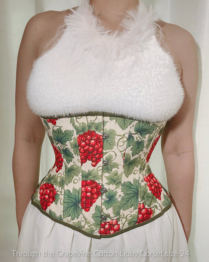 Through the Grapevine cotton corset, Libby (Libra gentle) silhouette, regular underbust length, modeled by Hannah who styled it with a fuzzy white halter top and white cotton skirt.