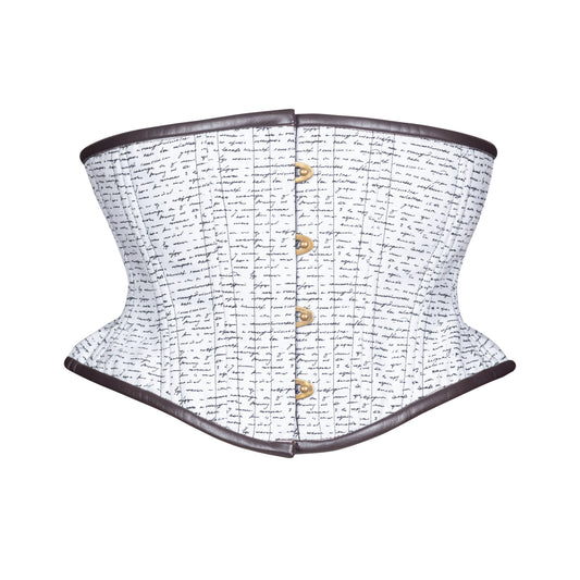 A structured corset with a white fabric body covered in black cursive script, dark brown leather binding trim along the top and bottom edges, an antique brass busk down the center front, shown on a plain white background.