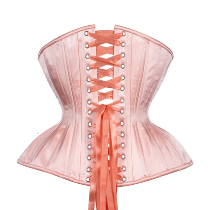 Peach Blossom, a soft peach satin corset, curvy Gemini straight rib silhouette, regular underbust length, back view with peach ribbon lacing 