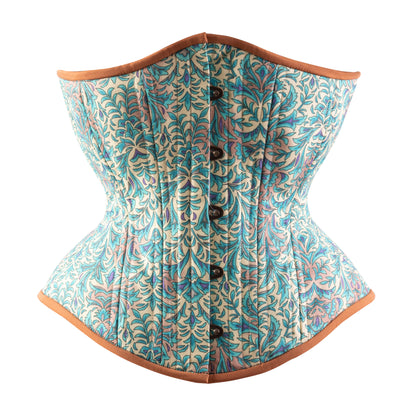 A bohemian style teal hourglass corset with brown trim and floral cotton print, front view.