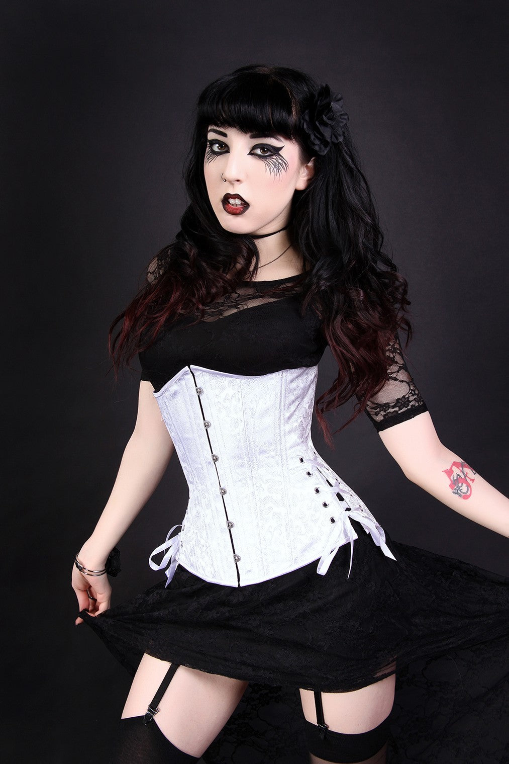 BUC-021 white brocade slim silhouette long length corset with hip ties, stylized view on model