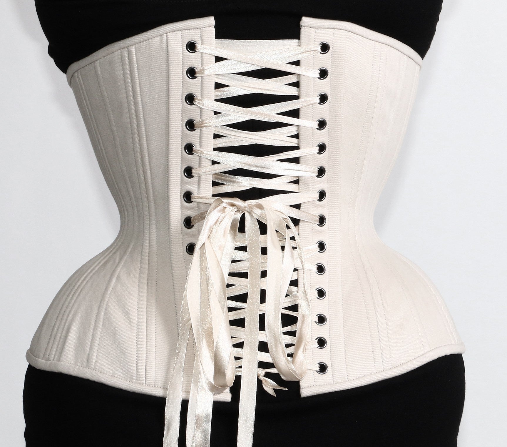 Beige cotton Gemini Corset, straight rib, regular length, back view with beige ribbon laces